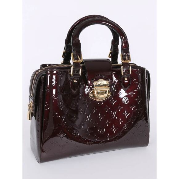 Louis Vuitton - Picture 1 of 15